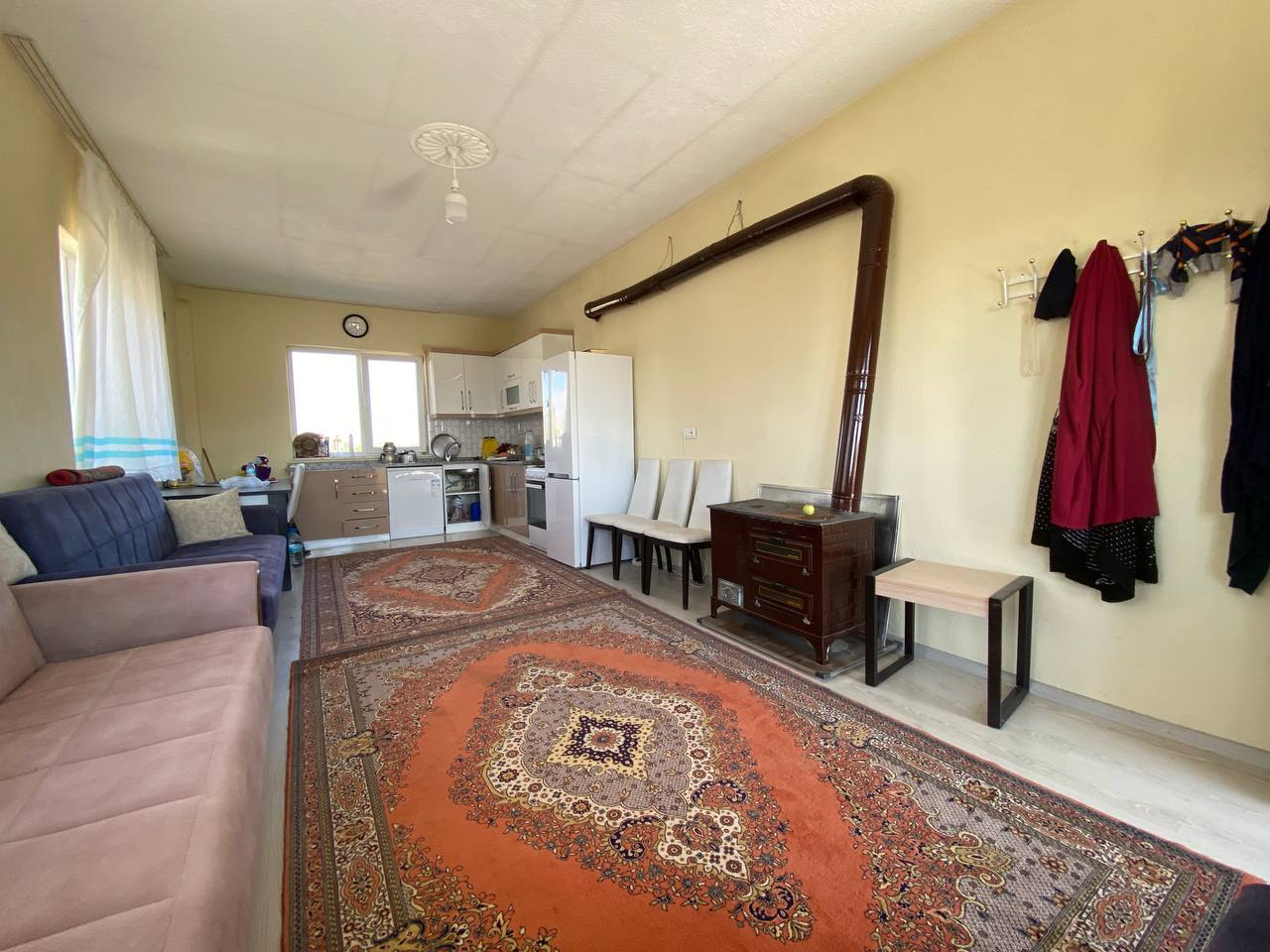 DEVELİ POLAT GAYRİMENKUL-TOMBAK MAH. SARAY HALI KARŞISI ANAYOLA SIFIR SATILIK ELMA BAHÇESİ
